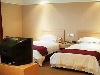 Eden Holiday Hotel Nantong Bagian luar foto