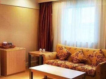 Eden Holiday Hotel Nantong Bagian luar foto
